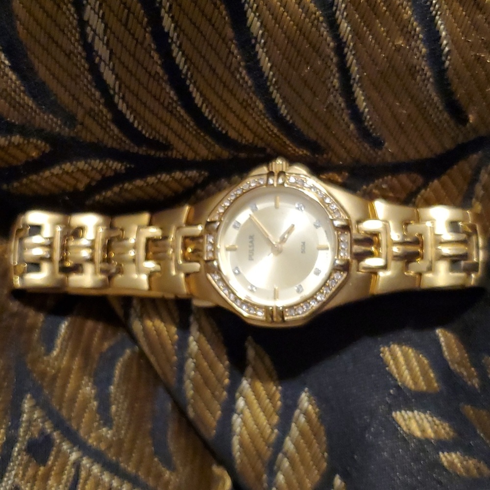Gold Pulsar Crystal Bezel Watch